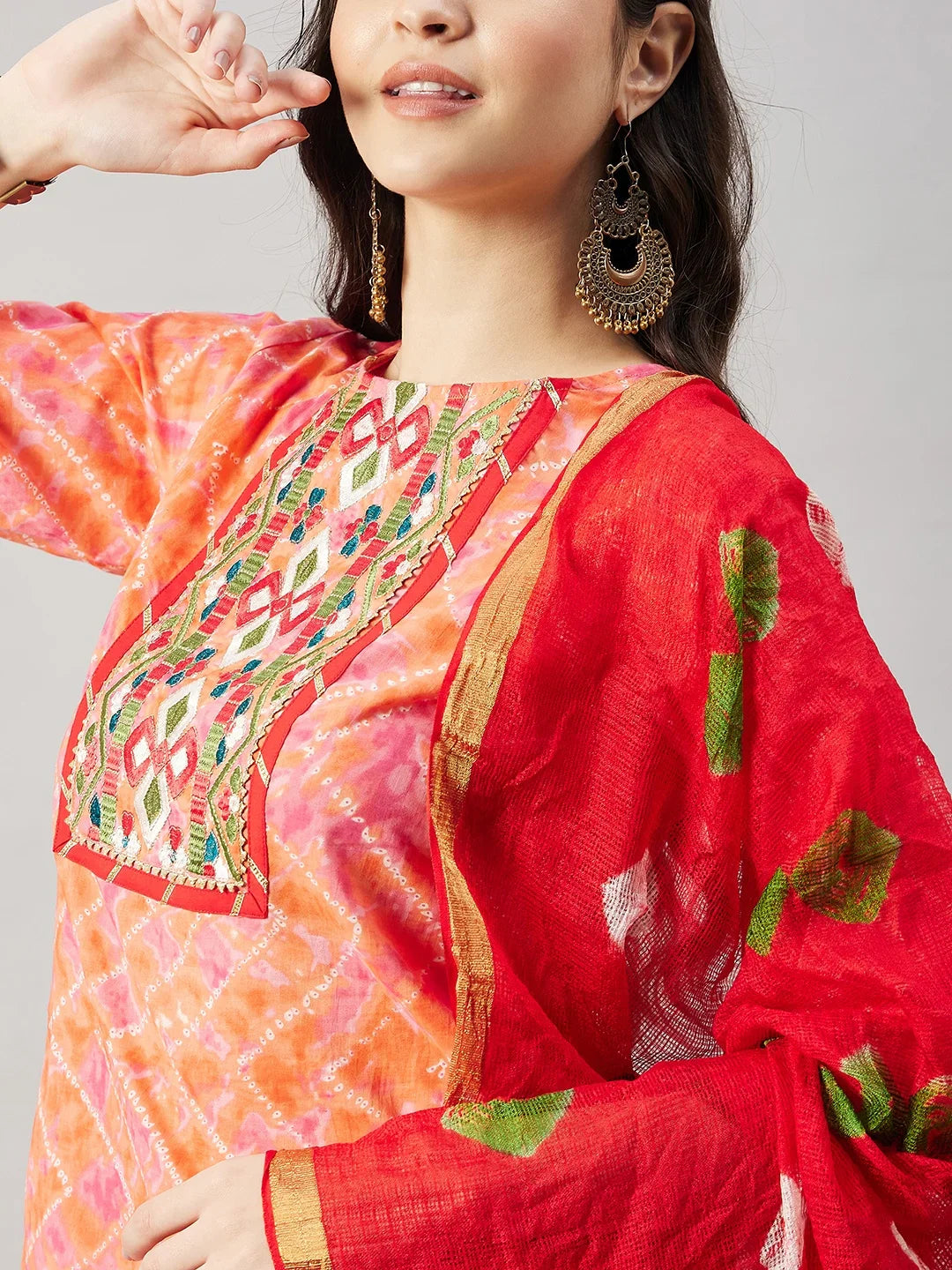 winered-woman-orange-cotton-kurta-set-with-neck-embroiderey-sharara-set