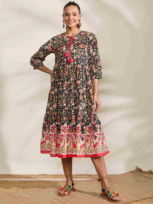 winered-navy-blue-printed-border-dress-with-tessels-at-yoke