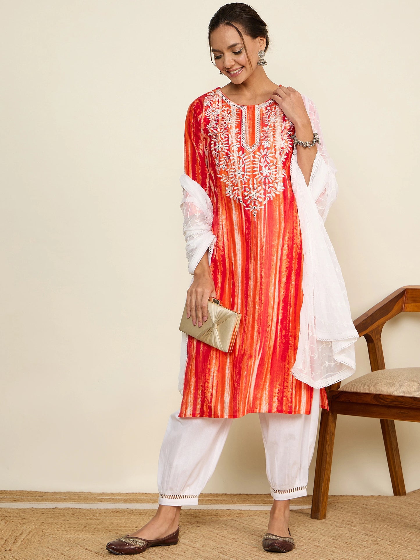 WineRed Woman Orange Embroidered Neck Straight Kurta set with Dupatta