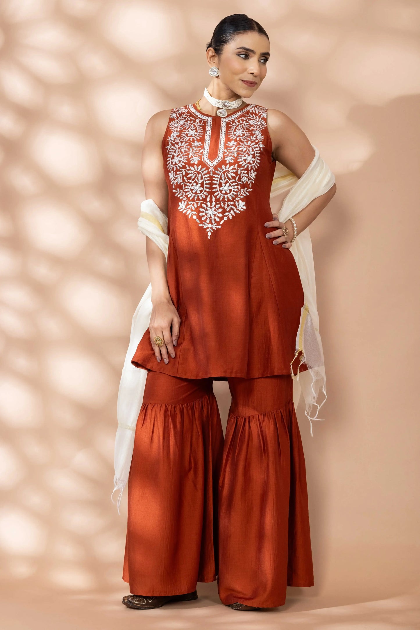 Women Rust Flared Kurta, Sharara and Dupatta Set