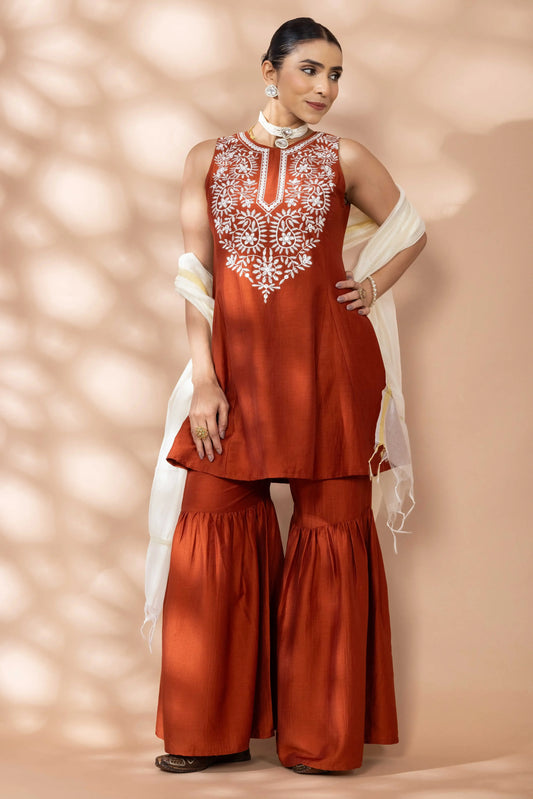 Women Rust Flared Kurta, Sharara and Dupatta Set