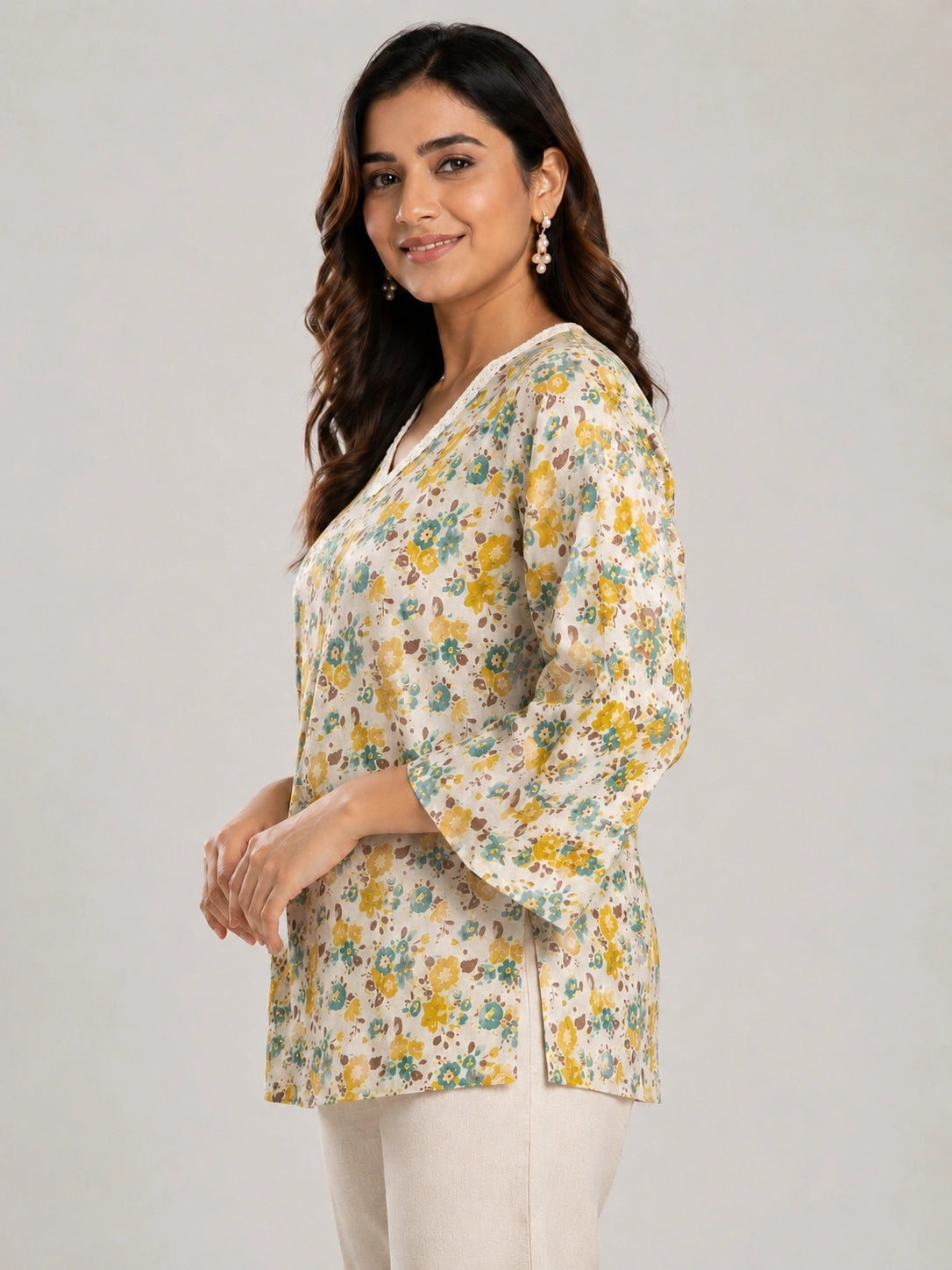 Women's Beige Floral Print Corset Style Short Kurti with V-Neck, Three-Quarter Flared Sleeves and Adjustable Back Tie-Up for Casual Wear