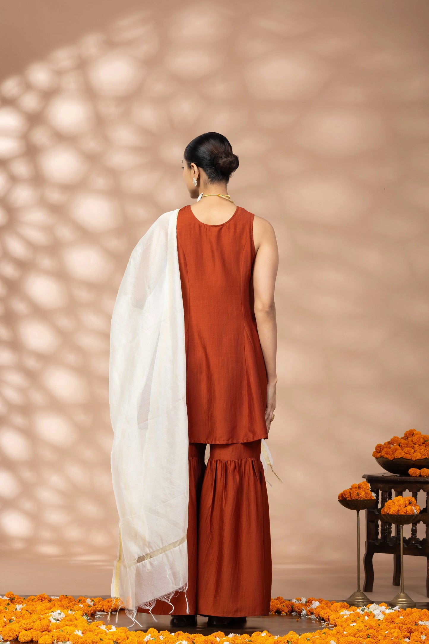 Women Rust Flared Kurta, Sharara and Dupatta Set
