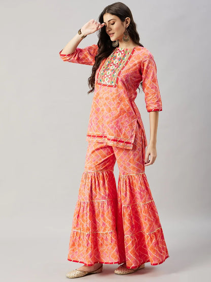 winered-woman-orange-cotton-kurta-set-with-neck-embroiderey-sharara-set