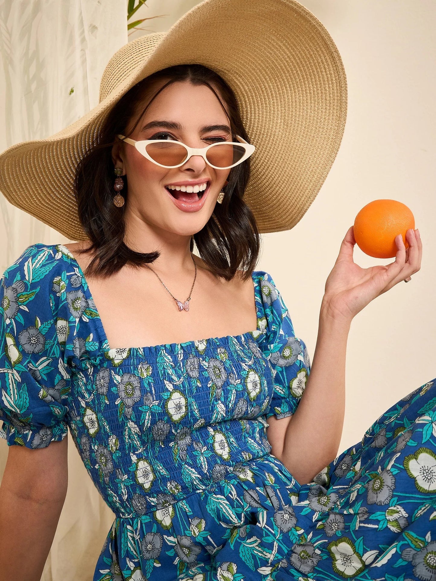 women-blue-floral-print-smocked-flare-dress