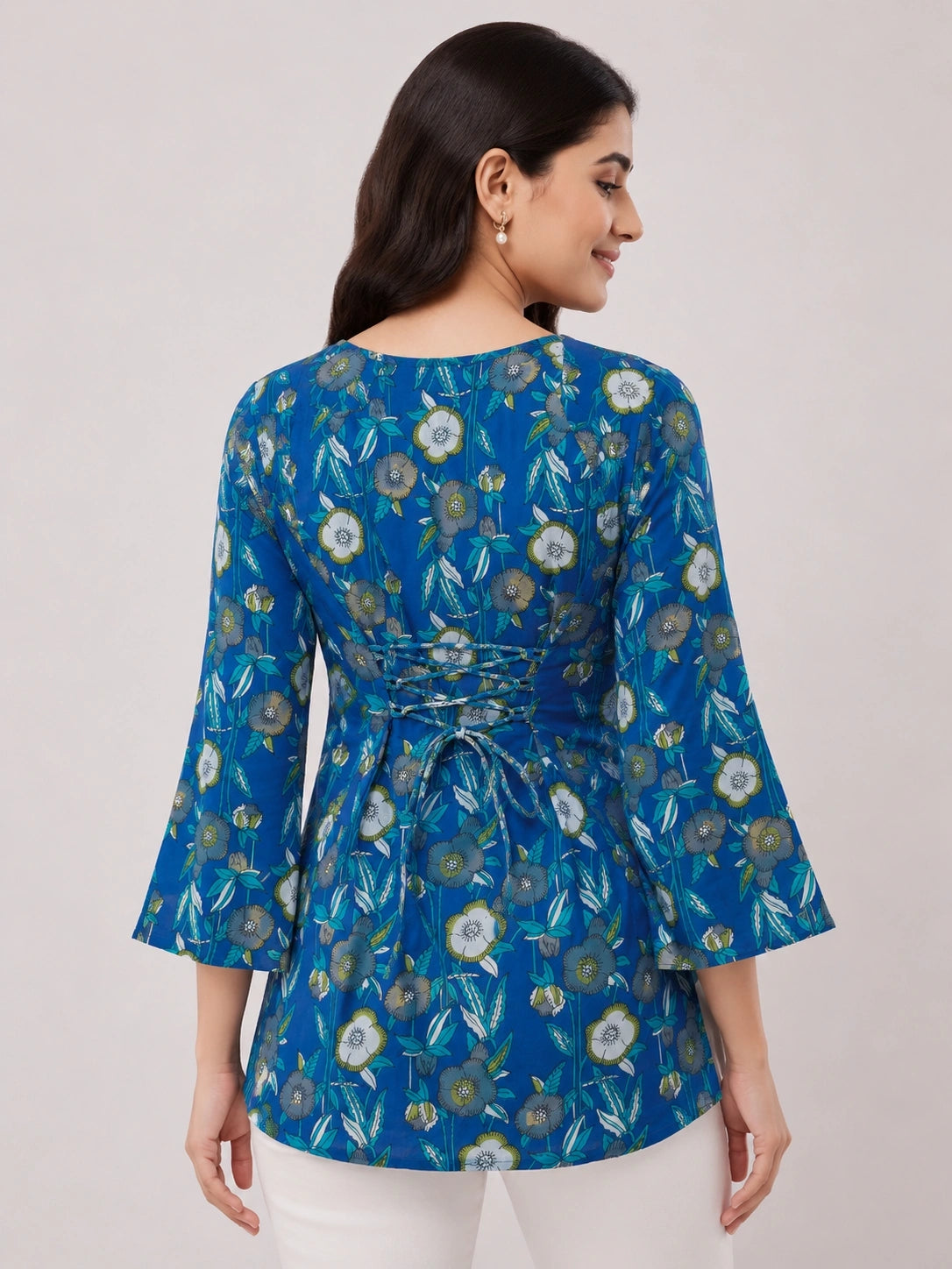 Women's Blue Floral Print Corset Style Short Kurti with V-Neck, Three-Quarter Flared Sleeves and Adjustable Back Tie-Up for Casual Wear