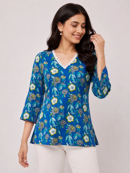 Women's Blue Floral Print Corset Style Short Kurti with V-Neck, Three-Quarter Flared Sleeves and Adjustable Back Tie-Up for Casual Wear