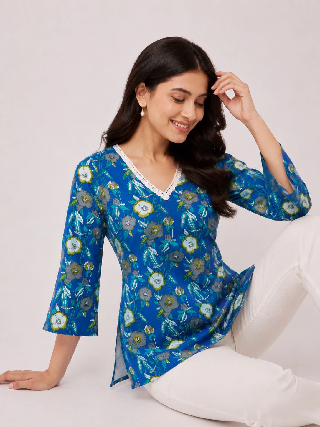 Women's Blue Floral Print Corset Style Short Kurti with V-Neck, Three-Quarter Flared Sleeves and Adjustable Back Tie-Up for Casual Wear