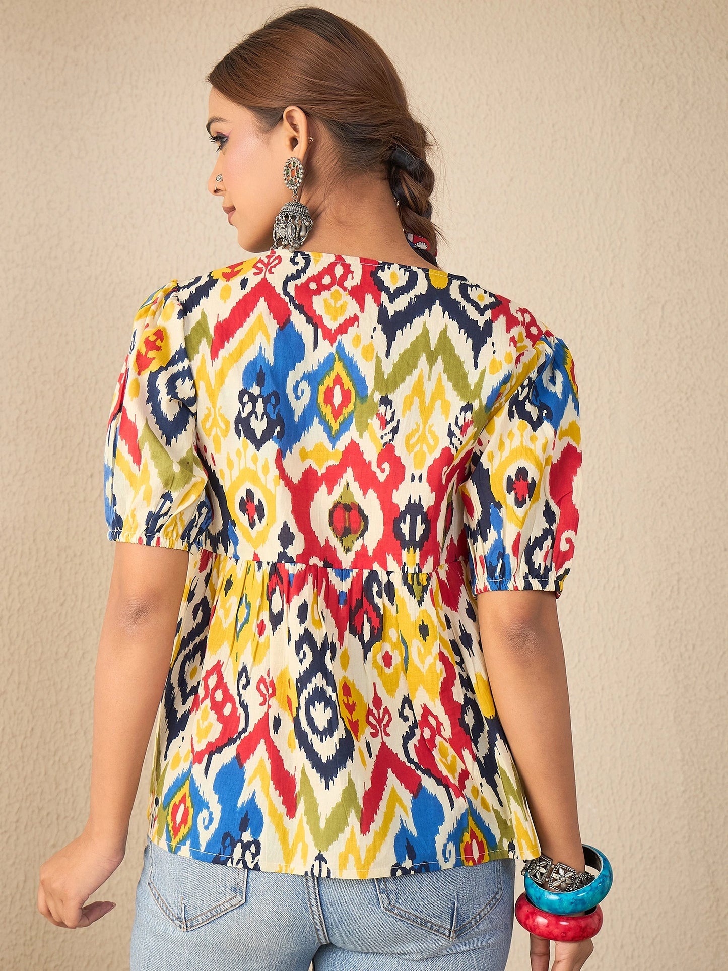 Women Yellow Printed Cotton Bow Detailed Peplum Top