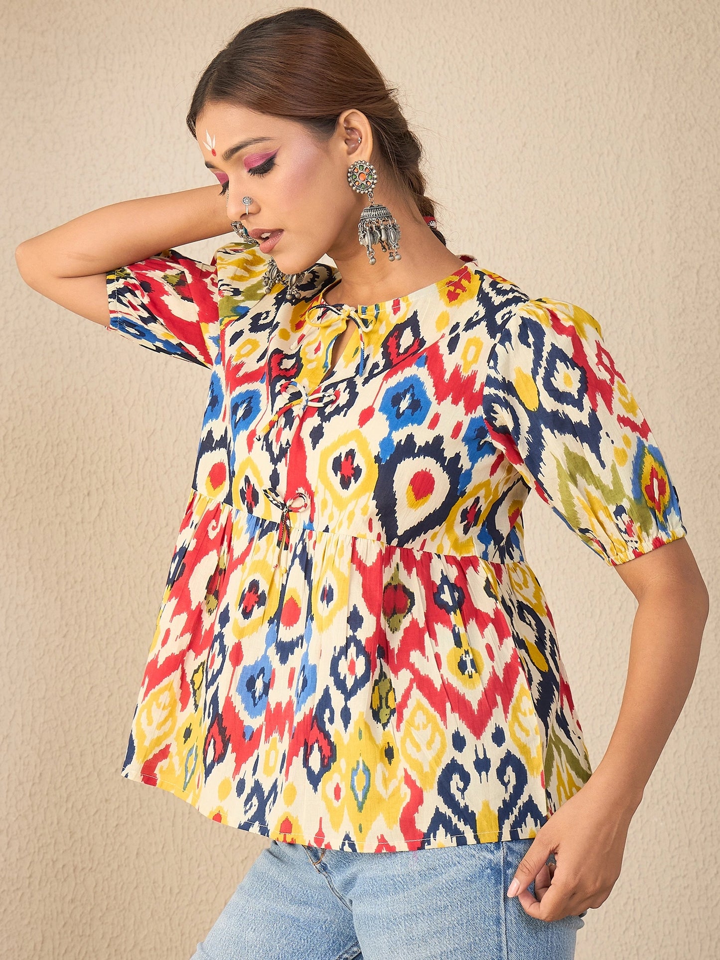 Women Yellow Printed Cotton Bow Detailed Peplum Top